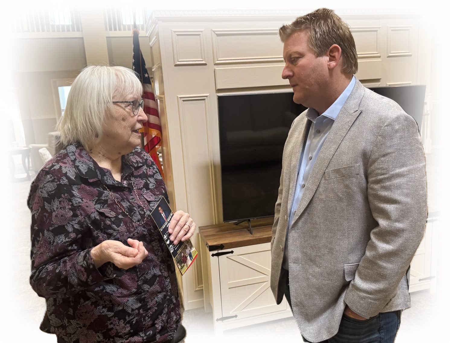 Derrick Kunz speaking with a Rockford resident